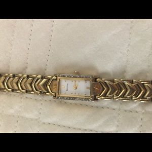 Bulova watch- gold with diamonds